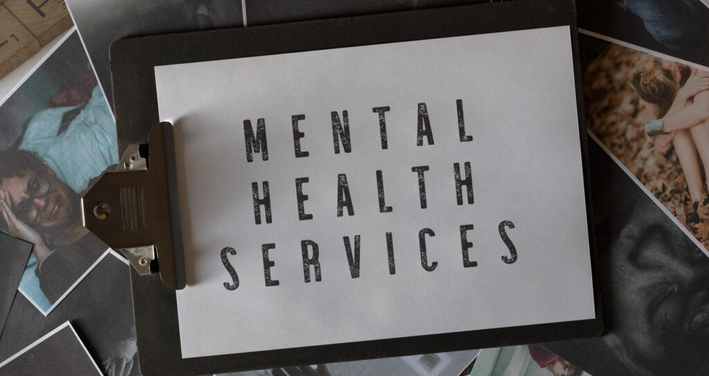placa com escrito sobre serviços de saúde mental, como a busca pela cura da ansiedade